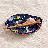 Crane-pattern ceramic dish and chopsticks with pink mochi