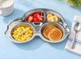 Car-shaped stainless kids tray with eggs, small pancakes and fruit