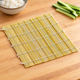 009129 bamboo sushi rolling mat on a wooden sushi preparation counter