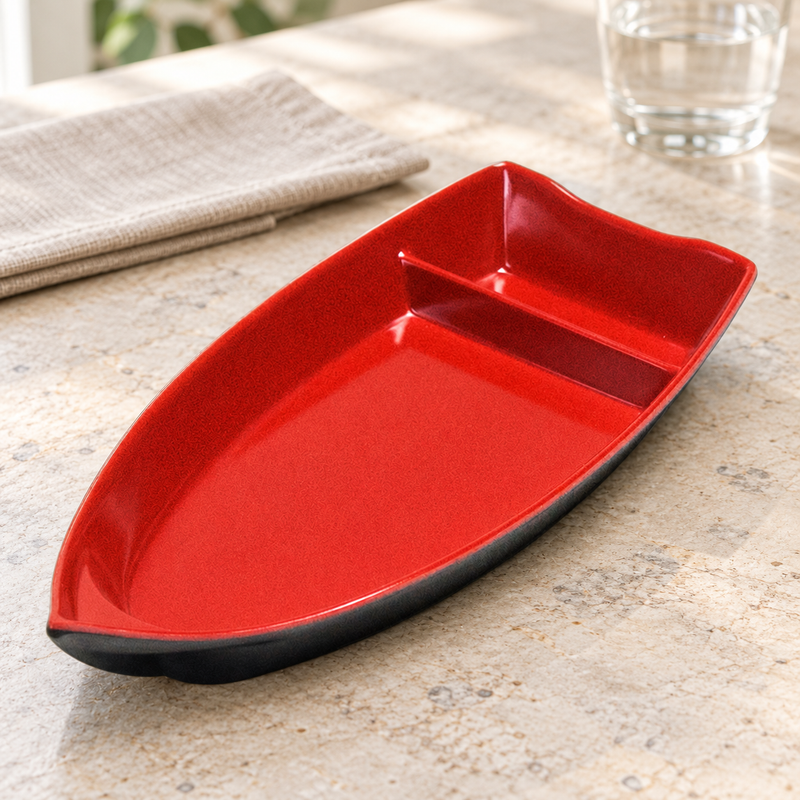 10-BR red and black melamine boat arranged on a dining table