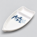 10-BZ white boat-shaped dish with blue bamboo pattern viewed from an elevated angle