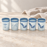11790 blue-and-white five-cup sake set on a pale tabletop with linen