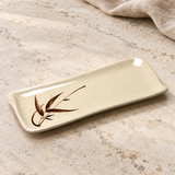 510-J beige bamboo-pattern rectangular plate on a pale stone counter