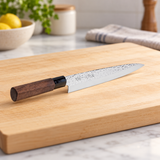8115-H2 sashimi knife on a preparation board