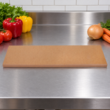 AG-114 cutting board on a stainless preparation counter