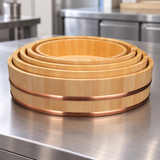 I-654 size range: five nested wooden rice tubs on a stainless preparation counter; sizes sold individually