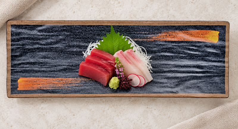 Overhead sashimi serving on the dark textured IT-1225G platter