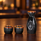 JX12-1 black and brown sake set with one bottle and two cups on a wooden table