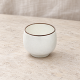 K30-PE sake cup on restaurant table