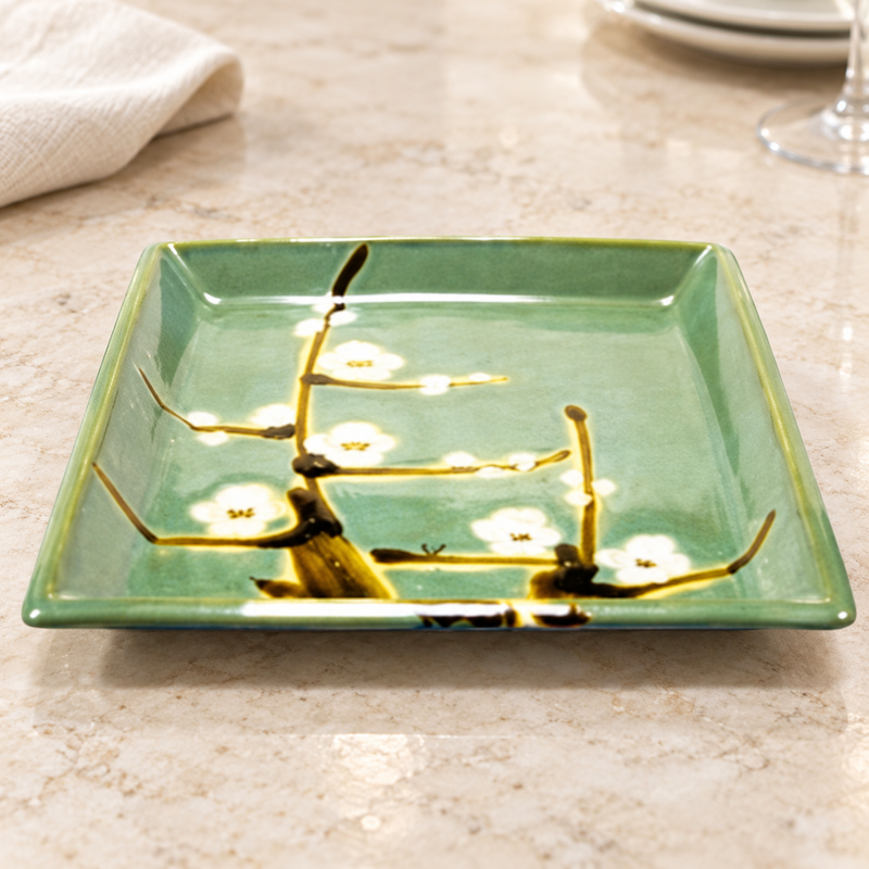 MS212-SU ceramic Plum Blossom platter in a tabletop setting