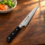 TU-9010 cooking knife on restaurant table