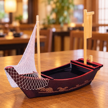 WM852 black and red sushi boat with net on a wooden restaurant table
