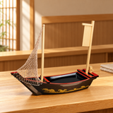 WM862 black and red sushi boat with net and blank banner shown empty on a wooden preparation counter