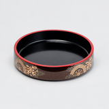 WO-17-4 black sushi oke with red rim and gold wheel pattern viewed from an elevated angle