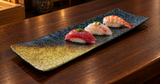YG-5014SP plate with nigiri on a wooden counter