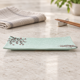 YG-5310PB mint green floral rectangular plate on a stone dining table