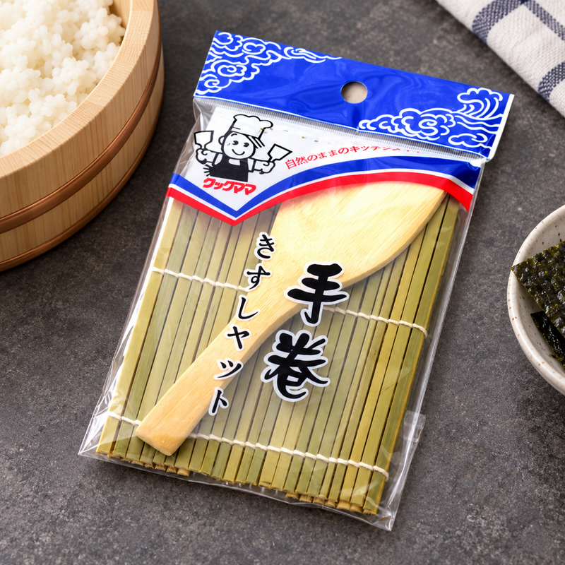 Sealed YM4 bamboo sushi mat and spatula set on a counter