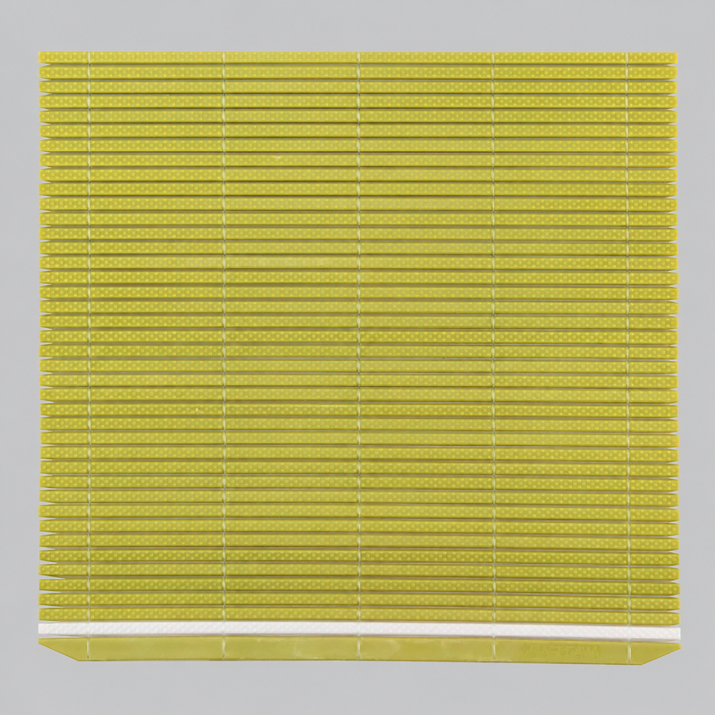Alternate view of the green FMK-MG mat laid flat, showing its slats and binding strands