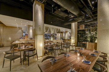 Black walnut plank live-edge tabletop in restaurant; base and seating not included