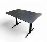Black wood-grain HPL patio tabletop shown with a base; base not included