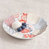 TN28-MS red floral patterned plate with white mochi and blueberries in a table setting