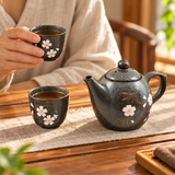 TPS2-742 black cherry blossom teapot and two cups during tea service