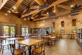 White oak butcher block tabletops in natural finish in restaurant setting; bases and other furniture not included; dimensions vary by size