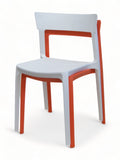 White open-back plastic restaurant chair; shown stacked with an orange chair