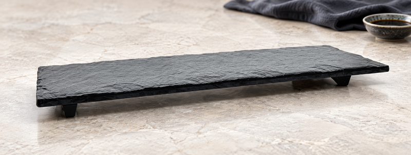 One YG-1012MB black slate-style melamine platter in a display setting