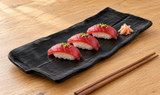 YG-5414MB matte black rectangular platter with three tuna nigiri and ginger