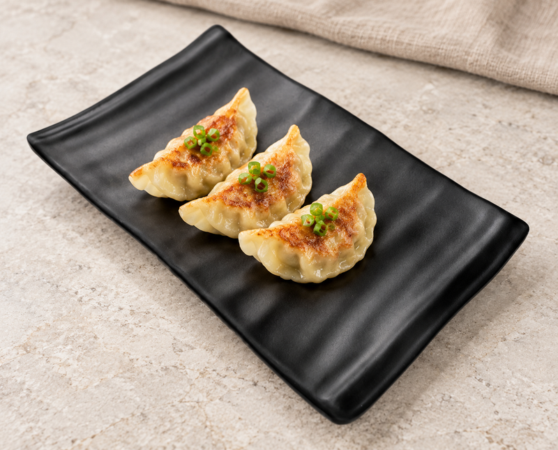 YG-5508MB waved-rim black melamine plate with dumplings