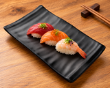 YG-5508MB single matte-black rippled rectangular plate with nigiri; serving suggestion