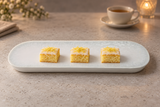 YG-5715NG Natural Series melamine serving plate with three petite lemon cakes