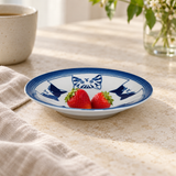 YG25-CT1 blue cat face plate with strawberries in a table setting