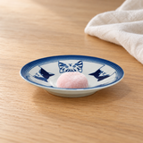 YG25-CT1 blue cat face plate with pink mochi in a table setting