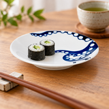 Blue octopus ceramic plate with two small cucumber maki
