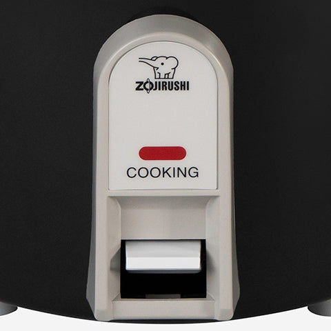 Close-up of the black NHS-06BA single switch and Cooking light.