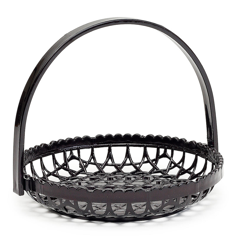 Black lacquer basket with a tall arched handle and scalloped rim