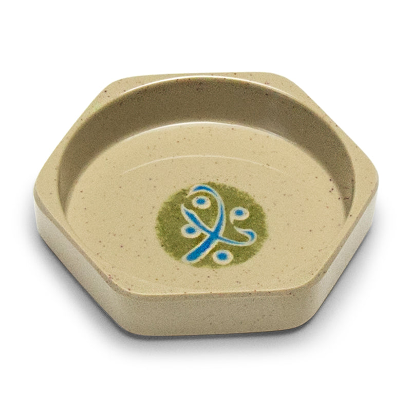 Beige octagonal melamine sauce bowl with a blue-and-green center motif.