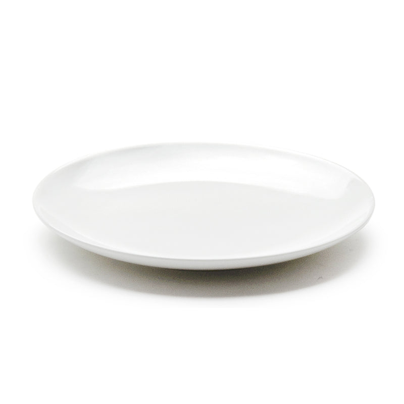 Authentic angled view of the A0020 white round ceramic plate, showing its open center and shallow rising rim.