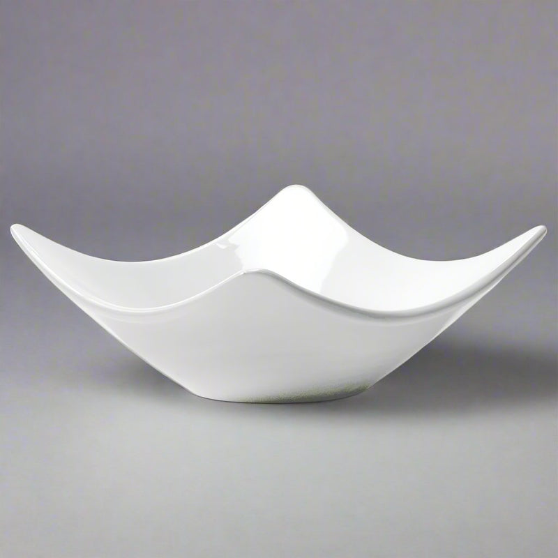Side view of the A1713 white bowl showing the rounded lower body and upswept square rim.