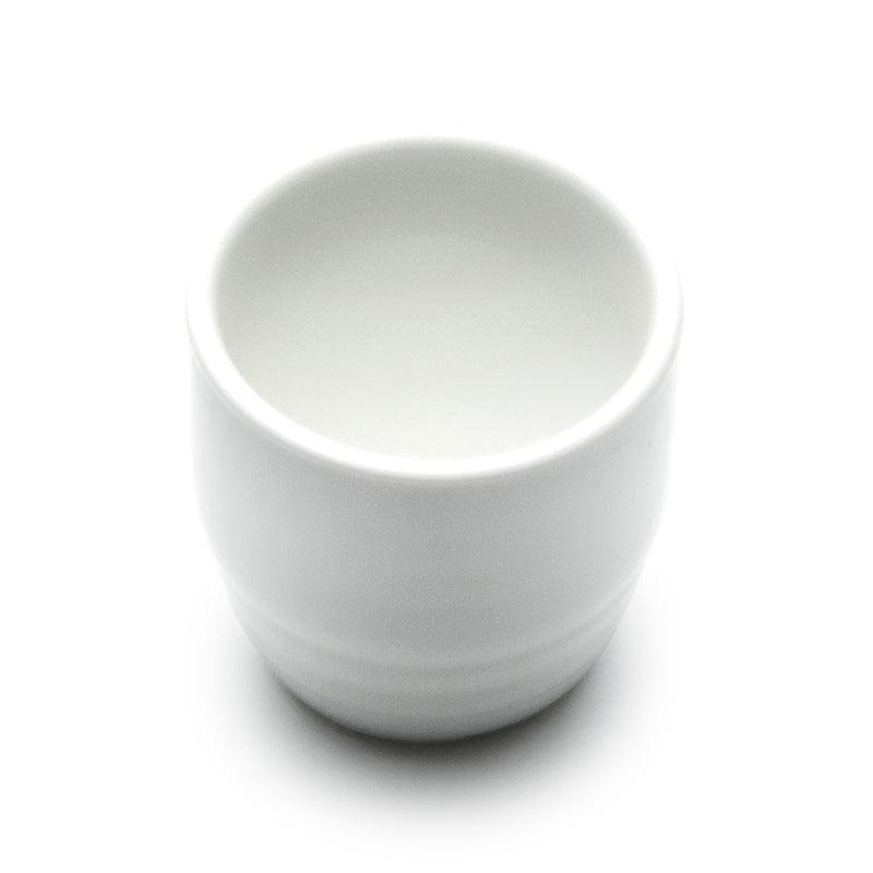 Angled view into the plain white interior of the A1888 sake cup