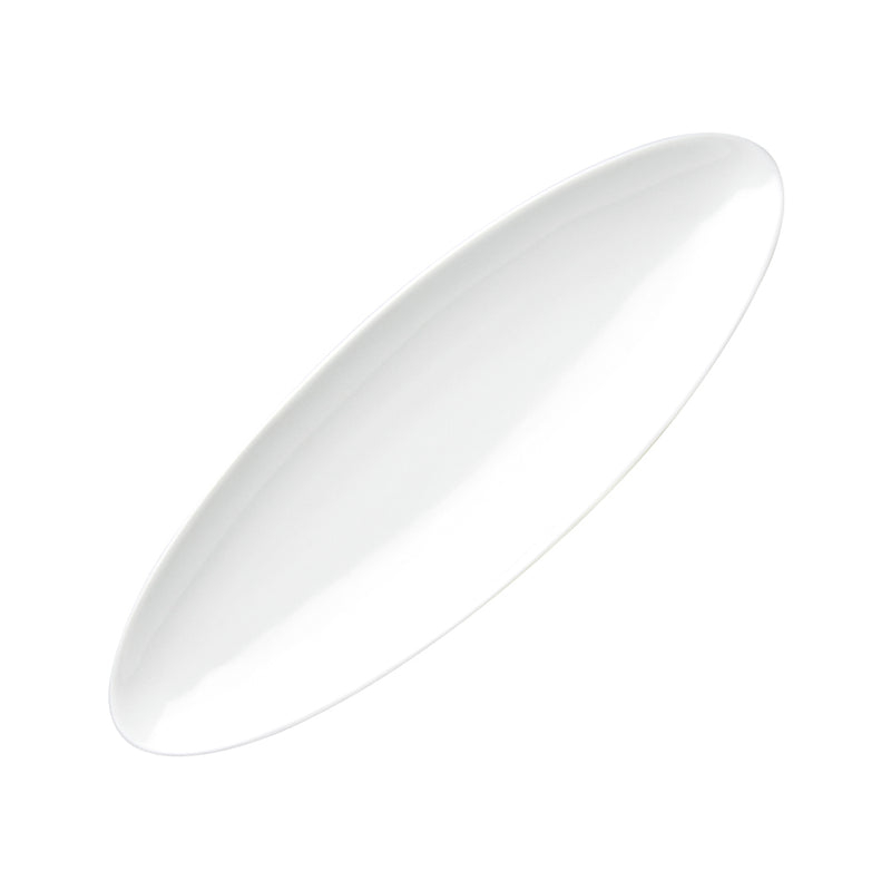 Angled top view of the white A2986 plate showing its elongated oval center and curved edge