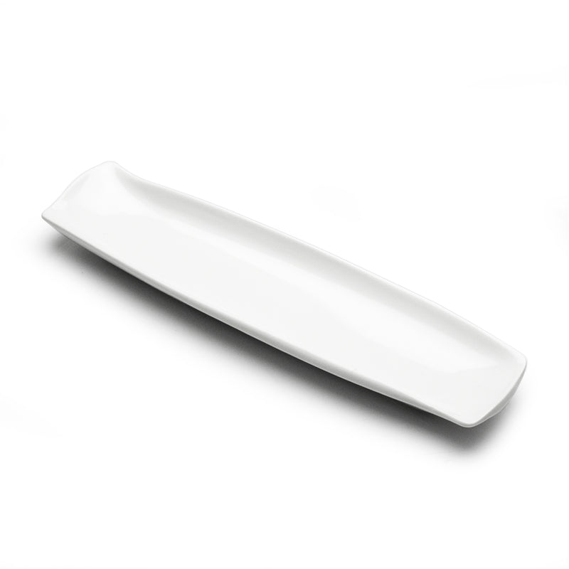 Angled view of the A4551 long white ceramic plate with gently raised edges and rounded corners