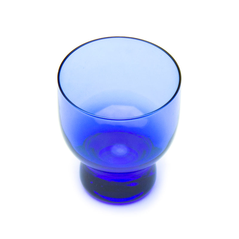 Top angled view of the blue glass sake cup and short foot