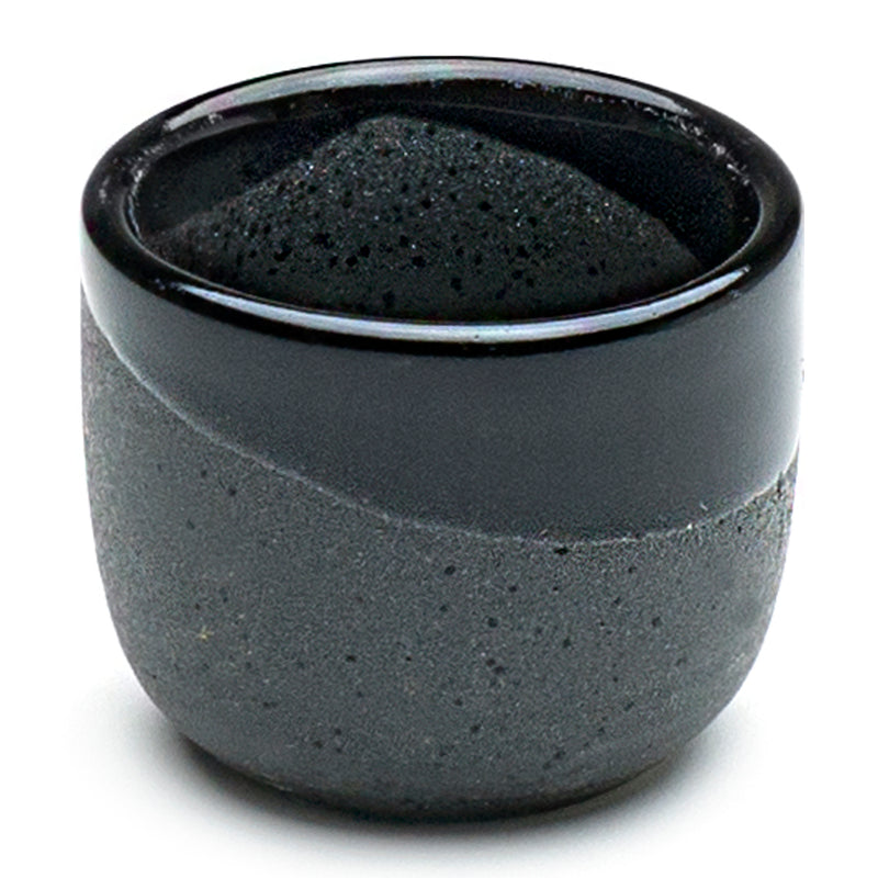 Close view of a JX9-6 cup showing the glossy black rim and textured grey lower body