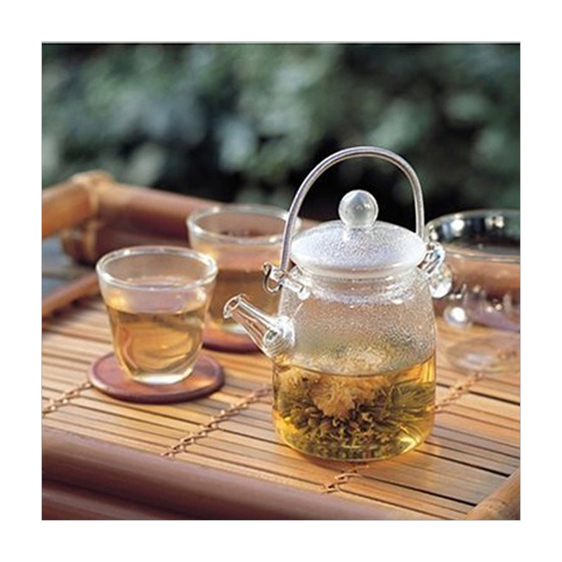 QSA-3512 — loose-leaf tea on a bamboo setting