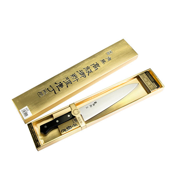 TU-9004 gyuto knife displayed in its original box