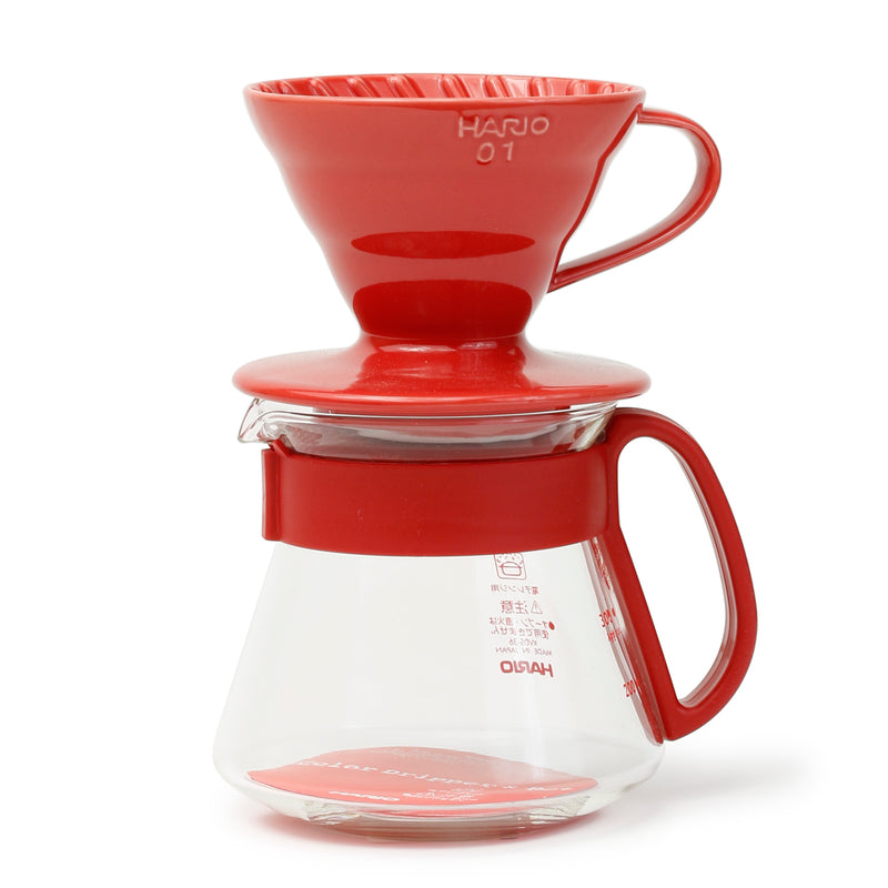 Red HARIO V60 01 dripper and pot set — dripper above, coffee below