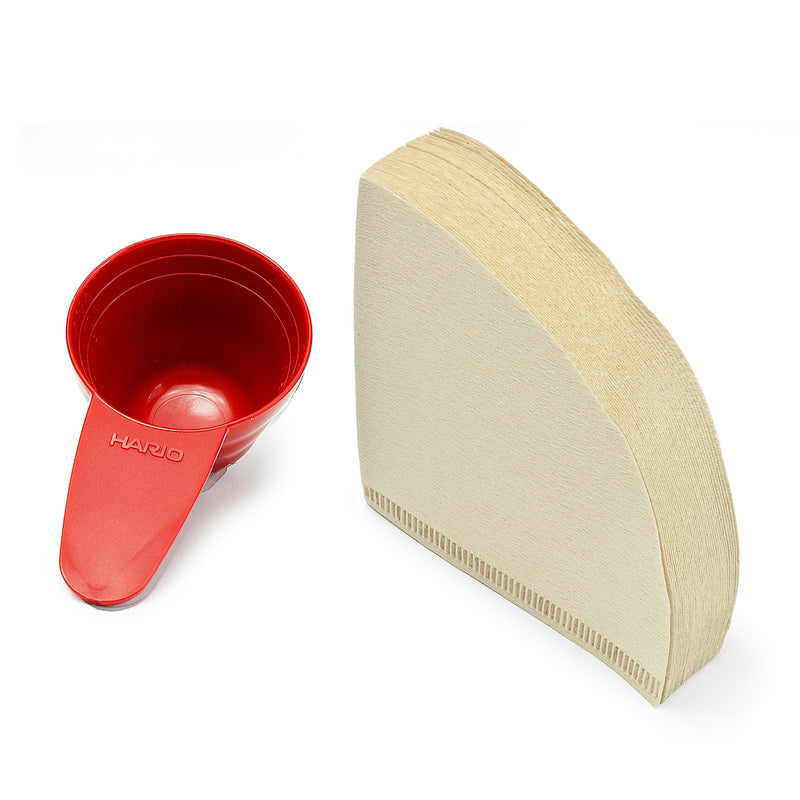 Red HARIO V60 01 dripper and pot set — filters and scoop close at hand